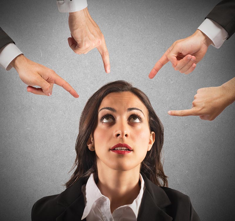 Woman Having Fingers Pointed at her